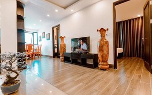 Luxury Apartment | Living area | Flat-screen TV - Maris Boutique Hotel (Ha Long)