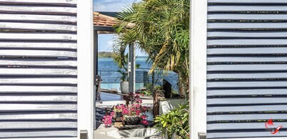 Charming waterfront villa, labeled "4 * tourism furnished"