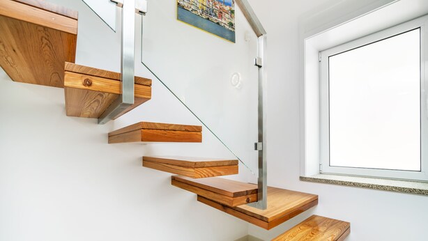 A modern staircase with wooden steps and a glass railing. - luxury house, new, (Porto)