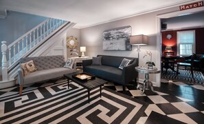 Smart TV, fireplace, books, printers