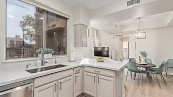 Coffee/tea maker, fridge, microwave, oven
