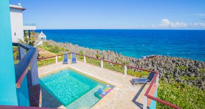 Stunning Coral View Home with Oceanfront Pool by RedAwning