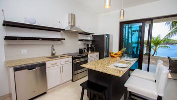 Condo, 1 Bedroom | Private kitchen | Fridge, microwave, oven, dishwasher