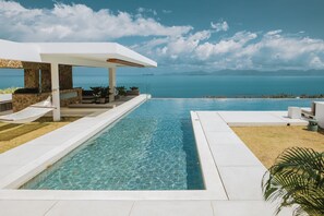 Outdoor pool, pool umbrellas, sun loungers