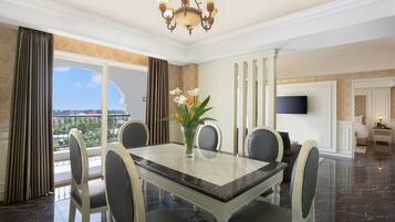 Presidential Room | Living area | 32-inch TV with cable channels