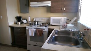 Full-sized fridge, microwave, oven, stovetop - Alupang Residence (Tamuning)