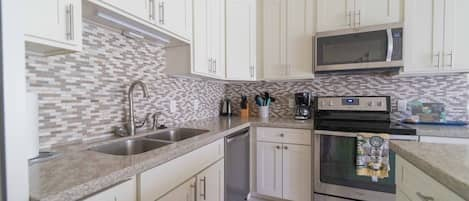 Condo, 1 Bedroom | Private kitchen | Fridge, microwave, oven, dishwasher