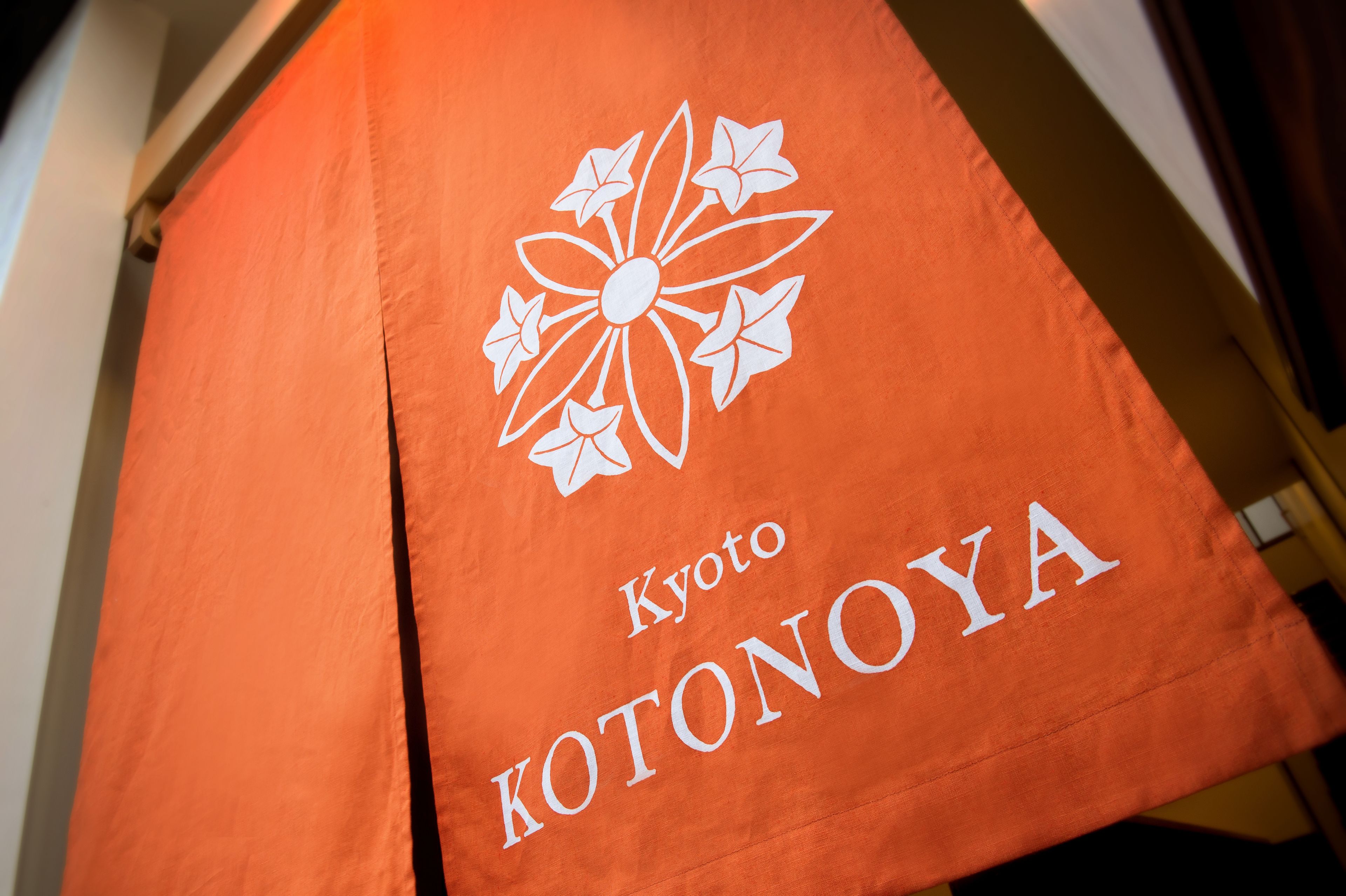 A towel with "Kyoto Kotonoya" printed on it.
