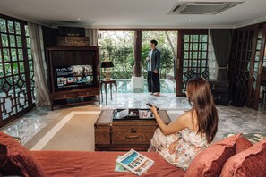 Honeymoon Suite, Private Pool | Living area | 32-inch LCD TV with satellite channels, TV