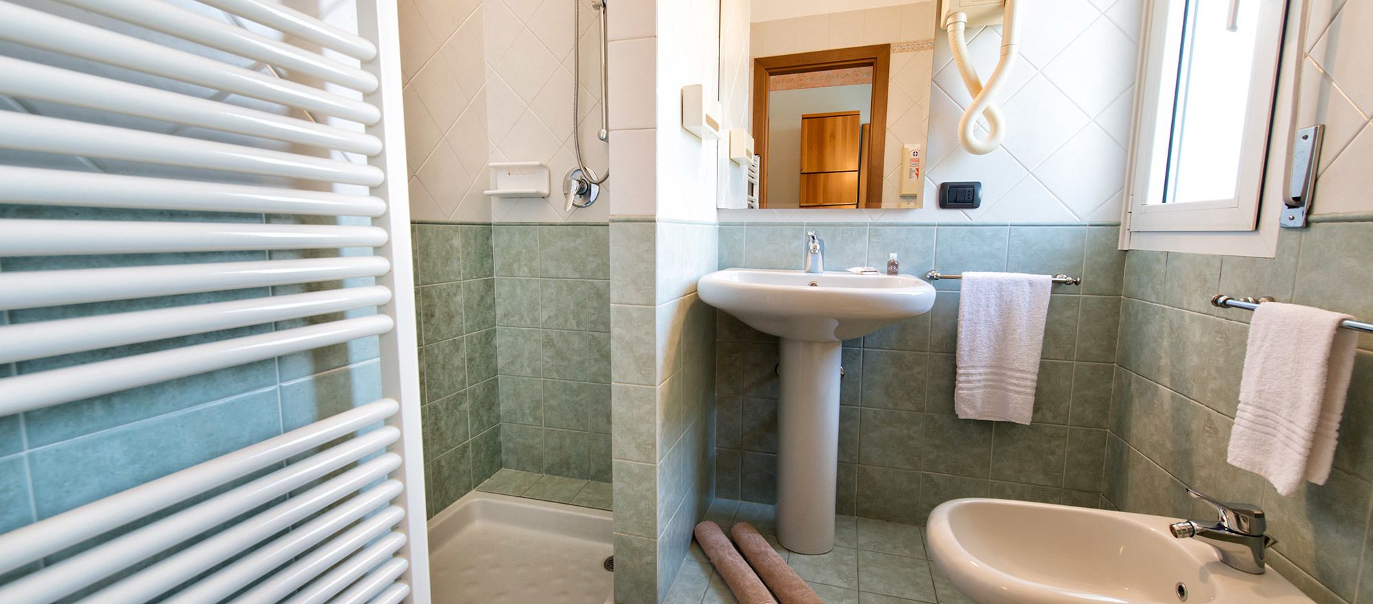 economy single room | bathroom | shower, free toiletries, hair dryer, slippers