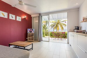 Panoramic Apartment, 1 Bedroom, Terrace, Bay View | Living area | 32-inch flat-screen TV with satellite channels, TV, toys