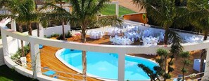 Seasonal outdoor pool, pool umbrellas, pool loungers