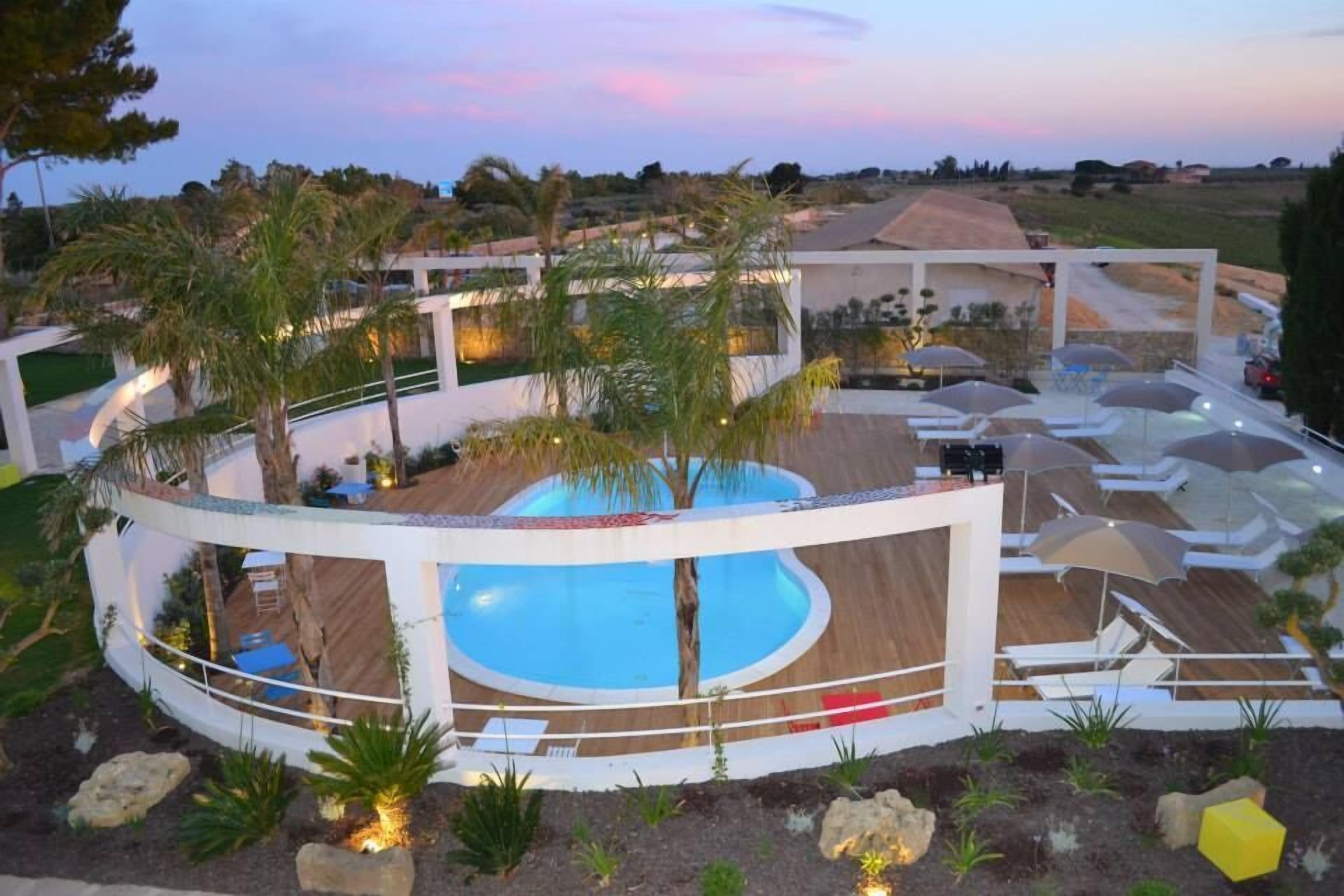 Seasonal outdoor pool, pool umbrellas, pool loungers