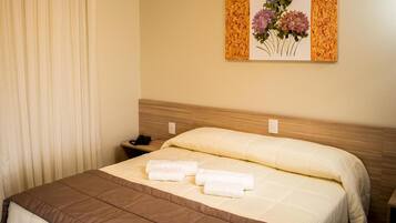 Frigobar, cortinas blackout, Wi-Fi de cortesia, roupa de cama
