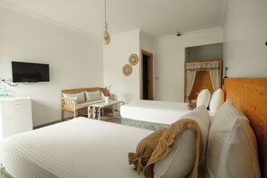 Premium bedding, desk, laptop workspace, blackout curtains