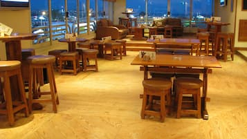 3 bars/lounges, poolside bar, beach bar