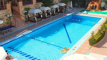 Outdoor pool, pool umbrellas, pool loungers