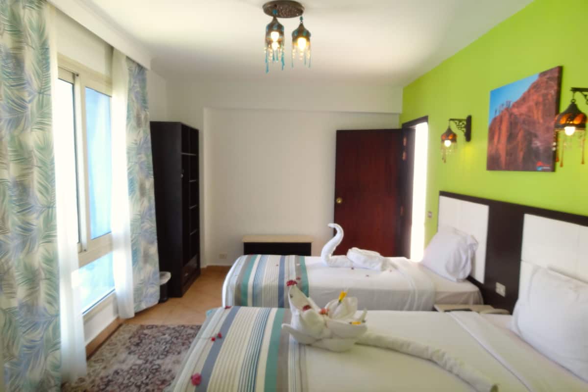 Economy Double or Twin Room | 1 bedroom, in-room safe, iron/ironing board, bed sheets