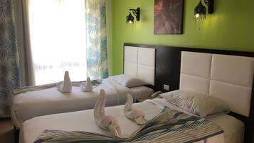 Economy Double or Twin Room | 1 bedroom, in-room safe, iron/ironing board (on request), bed sheets