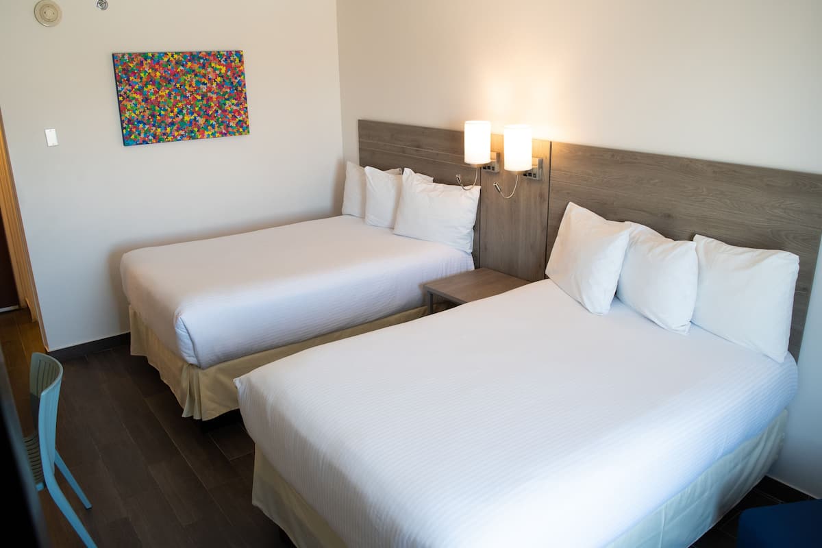 standard room, 2 double beds | 1 bedroom, minibar, in-room safe, desk