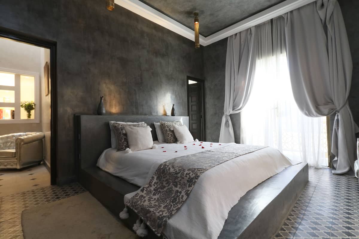 Suíte superior, para não fumantes | Roupas de cama premium, cortinas blackout, quartos à prova de som