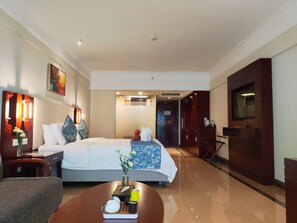 Premium bedding, down comforters, desk, laptop workspace