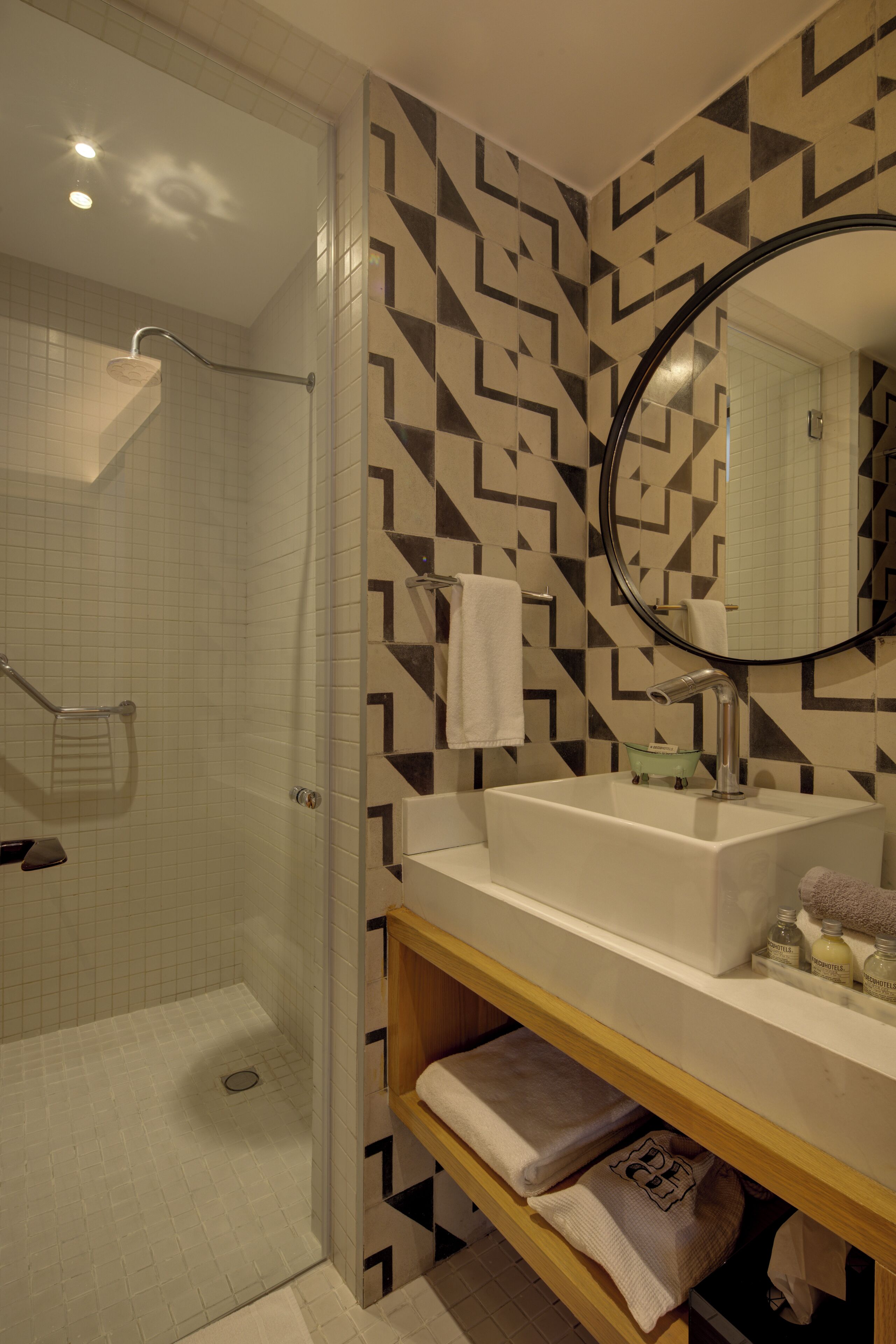 suite duplex | bathroom | shower, rainfall showerhead, hair dryer, towels