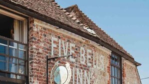 A historic building with a brick facade and a sign reading "Five Bells Inn." - The Five Bells Inn Brabourne (Ashford)