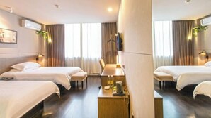 A hotel room with two beds, a desk, a chair, a TV, and a window with curtains. - Jinjiang Inn Select (Wujiang Tongli Yunliqiao) (Suzhou)