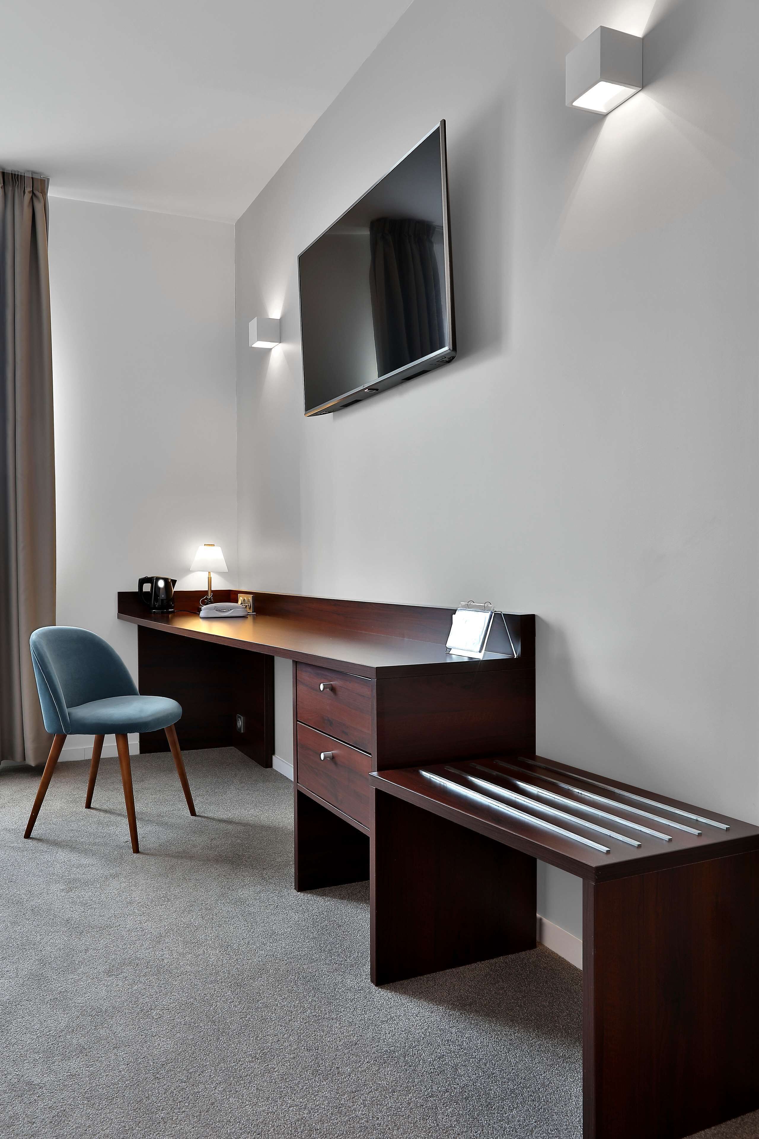 premium bedding, pillow-top beds, individually decorated, desk