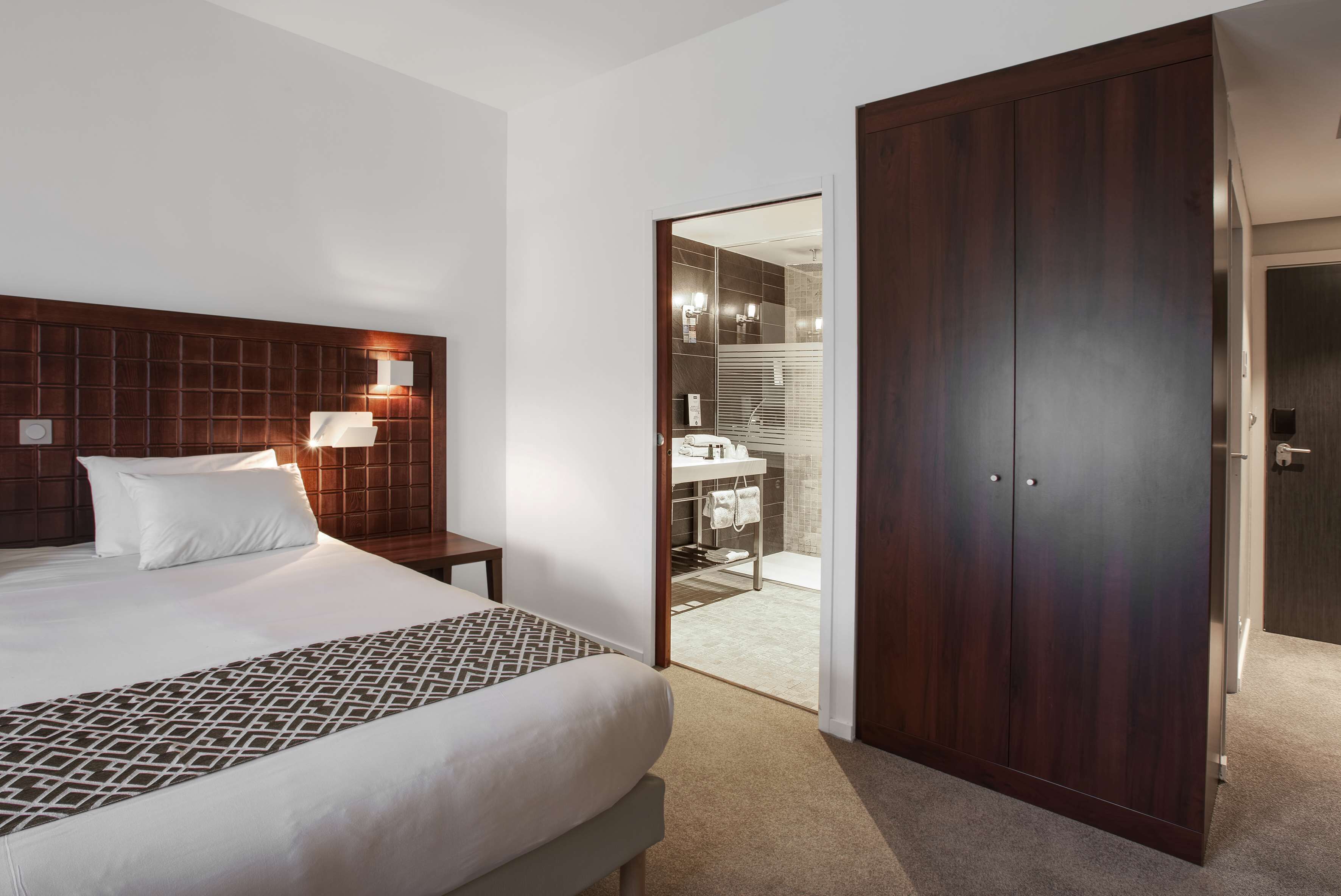 premium bedding, pillow-top beds, individually decorated, desk