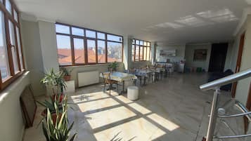 Economy Quadruple Room, Men only, Non Smoking, Shared Bathroom | Living area | LCD TV
