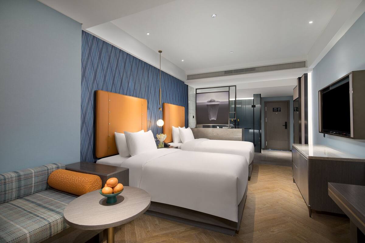 executive twin room | down duvets, minibar, individually decorated, blackout curtains