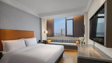Executive-Doppelzimmer | Daunenbettdecken, Minibar, individuell dekoriert, Verdunkelungsvorhänge