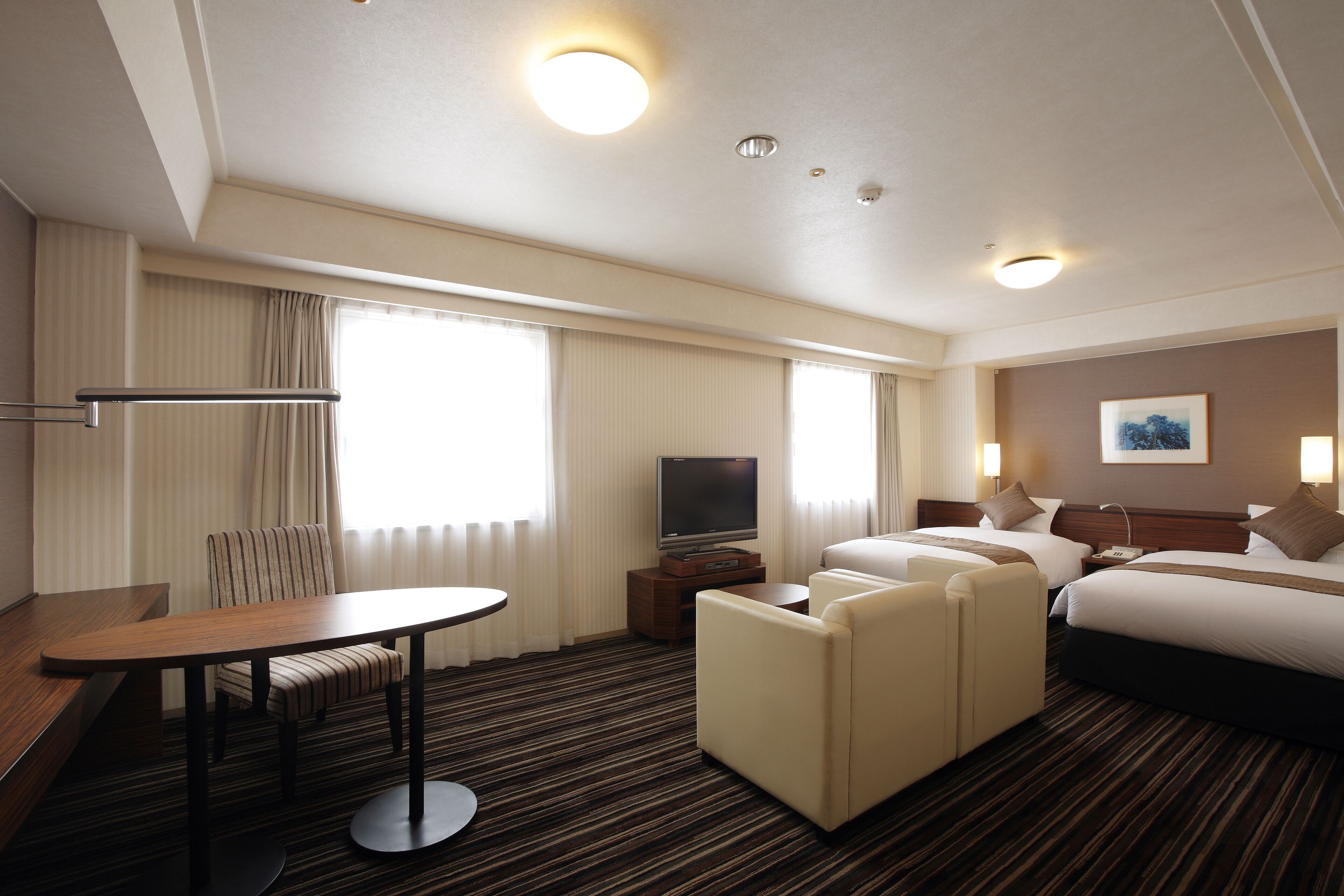 deluxe twin room, non smoking | 1 bedroom, desk, laptop workspace, free wifi