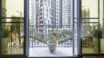 Habitación cuádruple superior, 2 camas matrimoniales | Vista del balcón