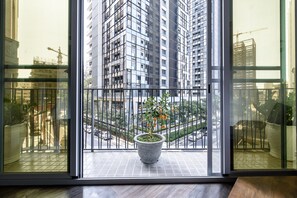 Superior Quadruple Room, 2 Double Beds | Balcony view - Treehouse Hostels (Tainan)