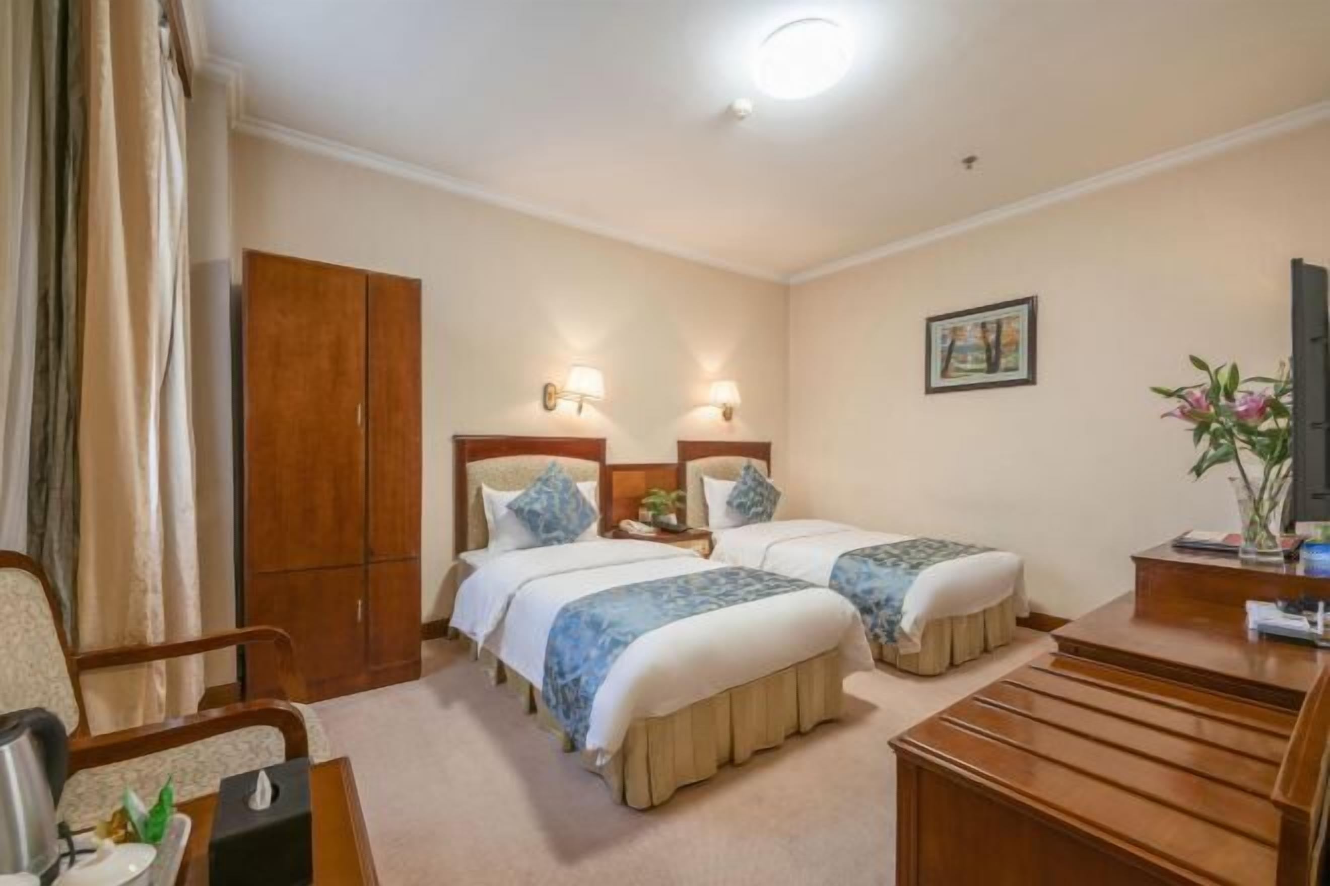 Desk, blackout curtains, rollaway beds, free WiFi