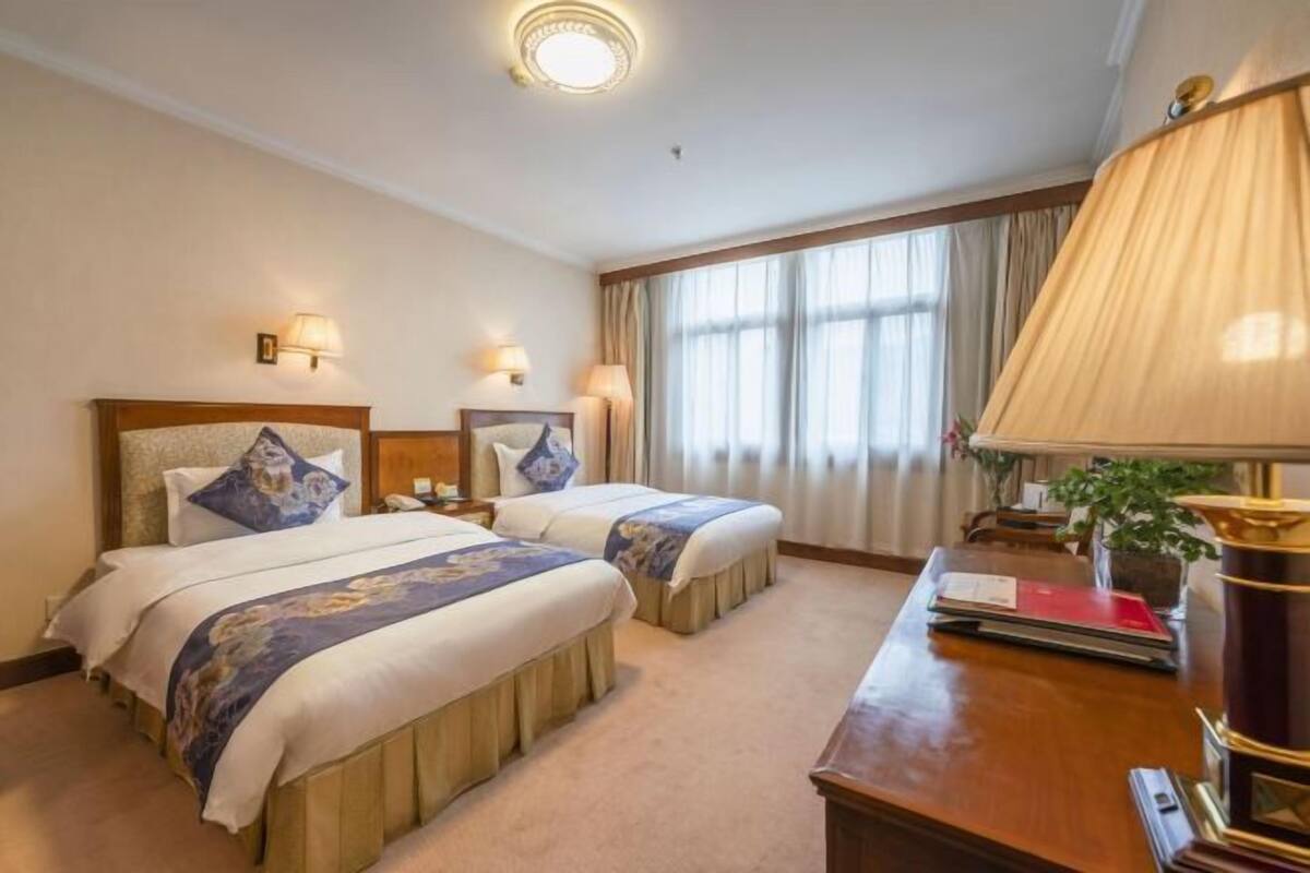 Desk, blackout curtains, rollaway beds, free WiFi
