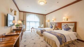 Desk, blackout drapes, rollaway beds, free WiFi