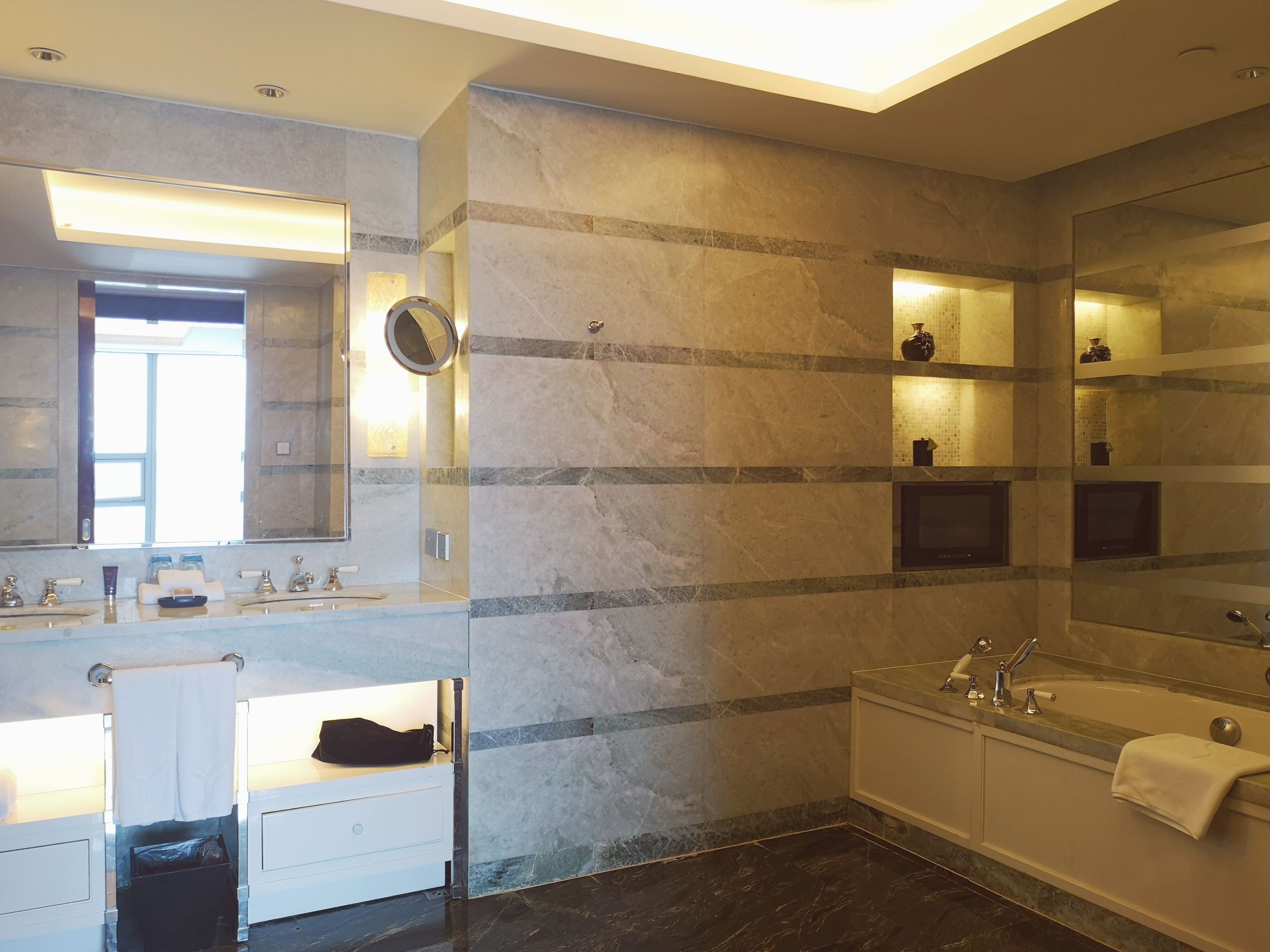 family deluxe suite | bathroom | designer toiletries, hair dryer, bathrobes, slippers