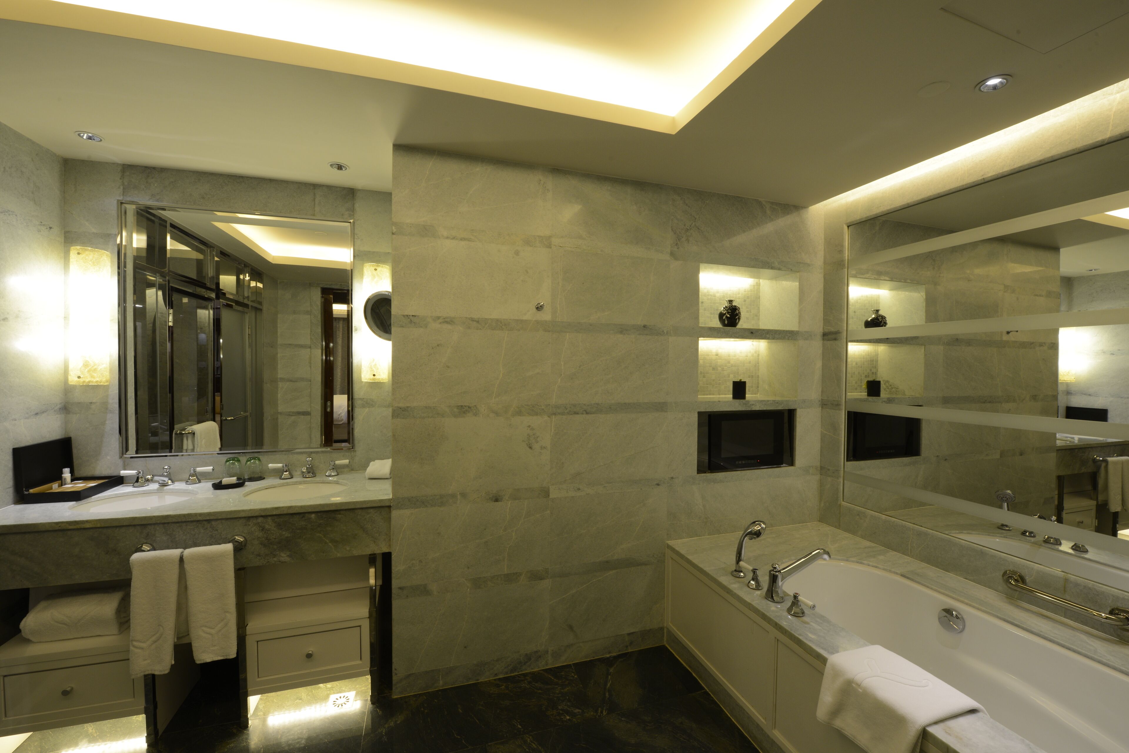 grand deluxe suite | bathroom | designer toiletries, hair dryer, bathrobes, slippers