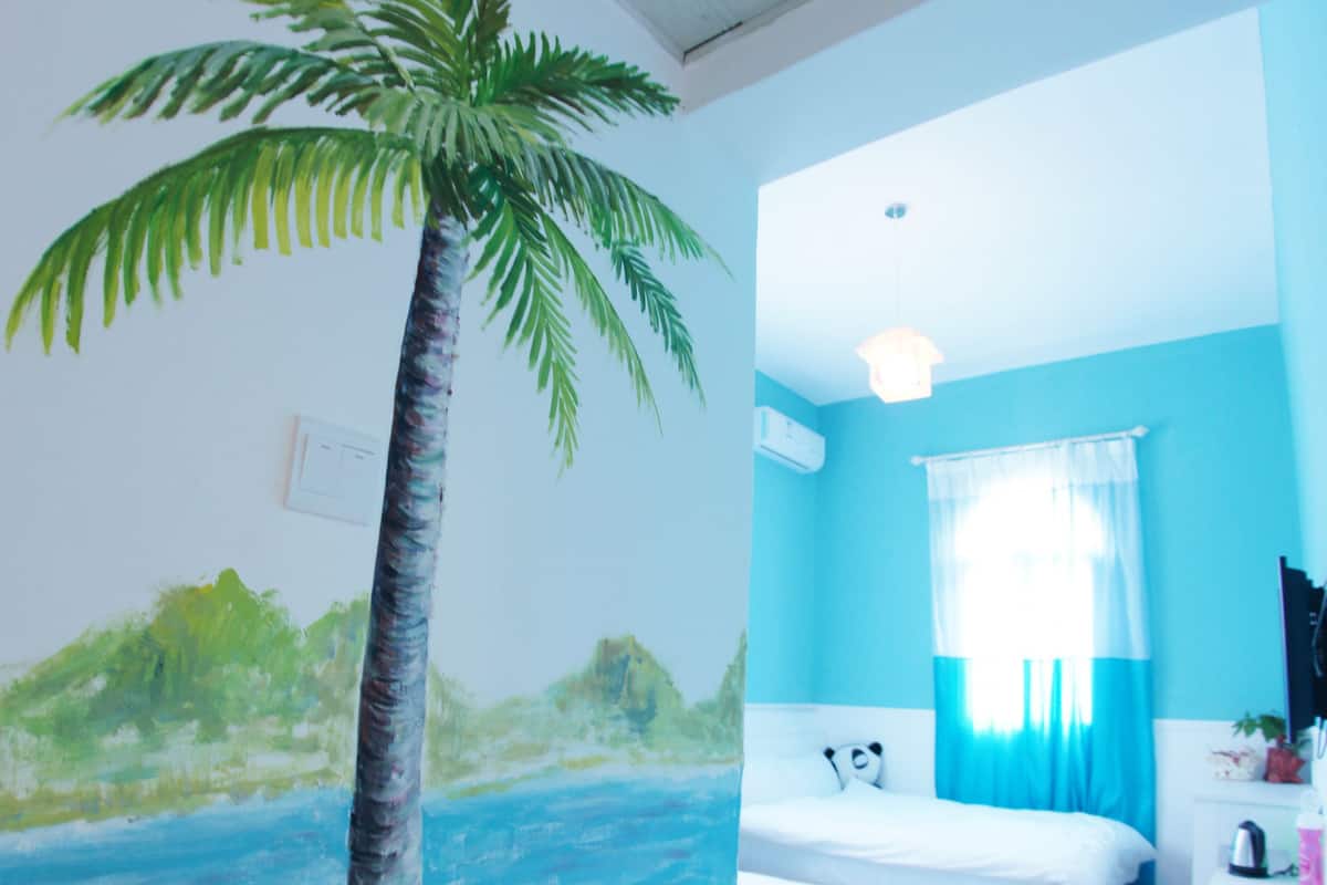 Ocean-style Family Room | Desk, blackout curtains, free WiFi