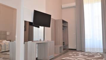 Roupas de cama premium, edredons de pluma, frigobar, cofres nos quartos