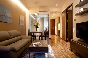 One Bedroom Apartment | Living room | 42-inch LCD TV with cable channels, TV - Saigon City Residence (Ho Chi Minh City)