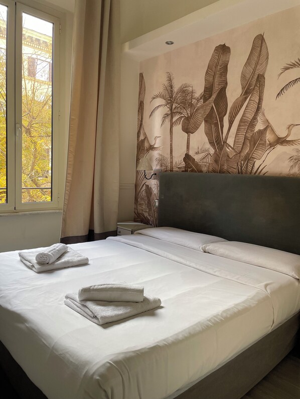 Habitación doble Deluxe, baño en la habitación | 1 habitación y ropa de cama de alta calidad