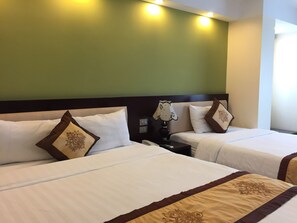 Chambre Triple Deluxe | Minibar, bureau, Wi-Fi gratuit