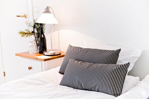 Ropa de cama de alta calidad y tabla de planchar con plancha