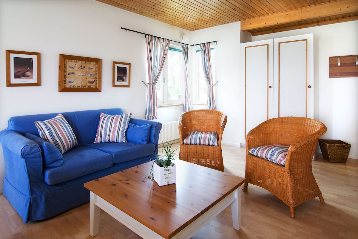 Chambre Double Classique, accessible aux personnes à mobilité réduite, rez-de-chaussée | Coin séjour