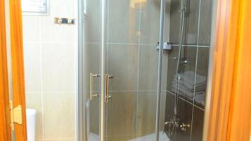 Shower, free toiletries, hair dryer, slippers